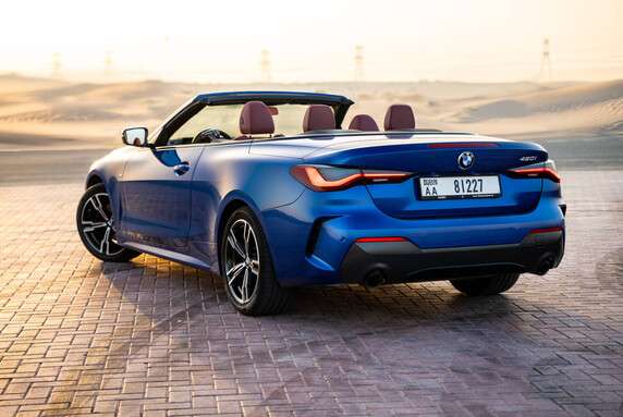 Affordable BMW repair in Dubai – mechanic servicing BMW engine at Affordable Mechanics garage